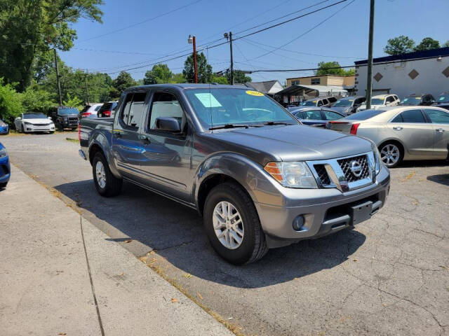 2016 Nissan Frontier for sale at DAGO'S AUTO SALES LLC in Dalton, GA