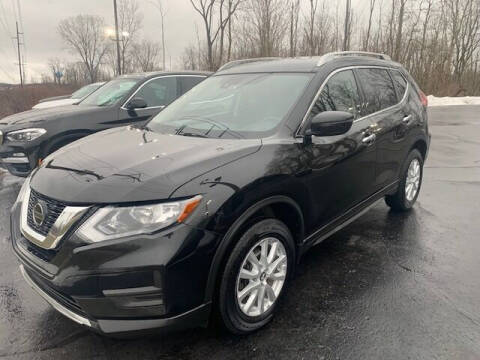 2019 Nissan Rogue for sale at Lighthouse Auto Sales in Holland MI