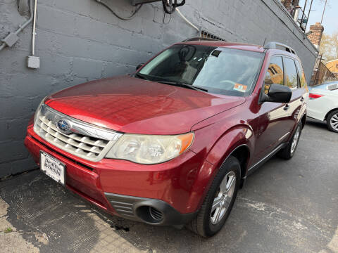 2011 Subaru Forester for sale at DEALS ON WHEELS in Newark NJ