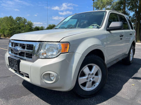 2009 Ford Escape for sale at IMPORTS AUTO GROUP in Akron OH