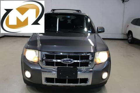 2009 Ford Escape for sale at Midway Auto Group in Addison TX