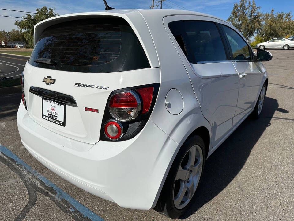 2014 Chevrolet Sonic for sale at DRIVE N BUY AUTO SALES in OGDEN, UT