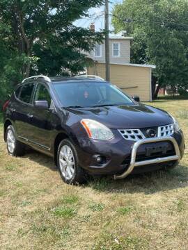 2013 Nissan Rogue for sale at Suburban Auto Sales LLC in Madison Heights MI