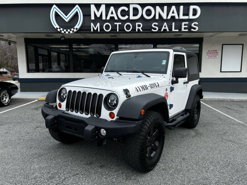 2012 Jeep Wrangler for sale at MacDonald Motor Sales in High Point NC
