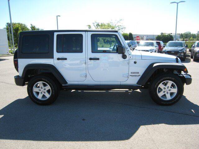 2017 Jeep Wrangler Unlimited for sale at FINNEY'S AUTO & TRUCK in Atlanta IN