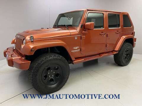 2009 Jeep Wrangler Unlimited for sale at J & M Automotive in Naugatuck CT