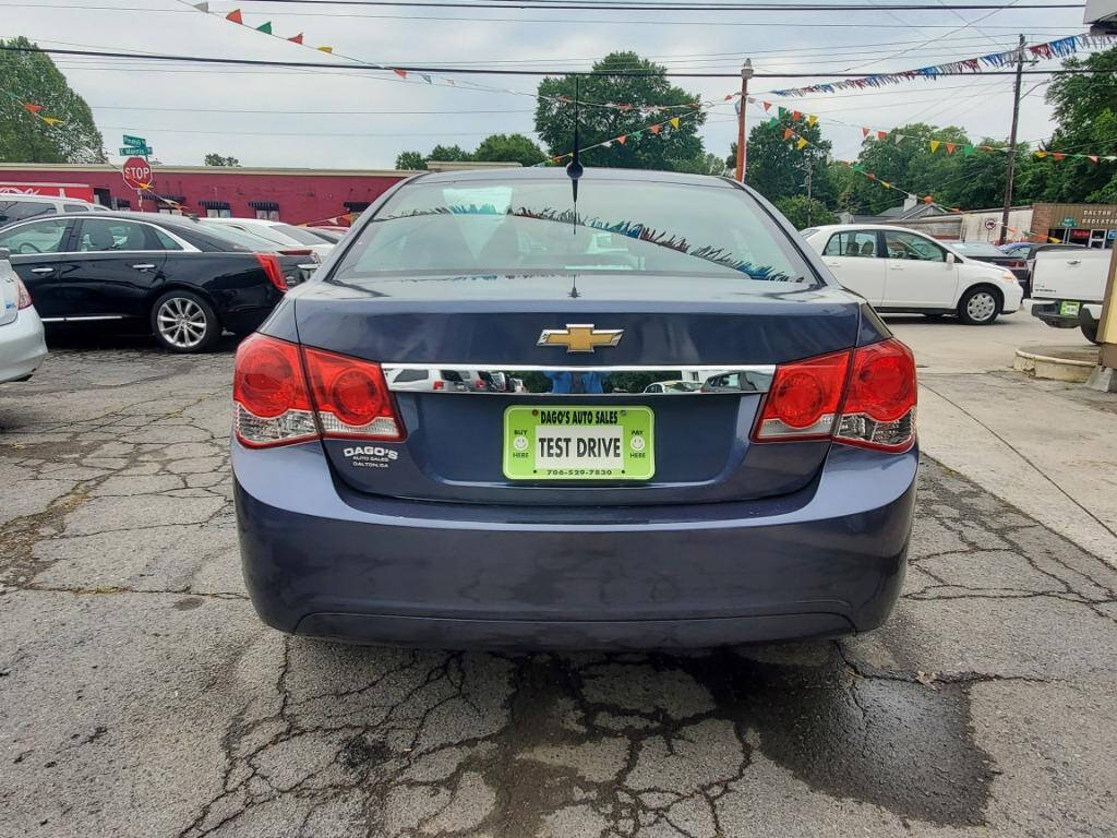 2014 Chevrolet Cruze for sale at DAGO'S AUTO SALES LLC in Dalton, GA