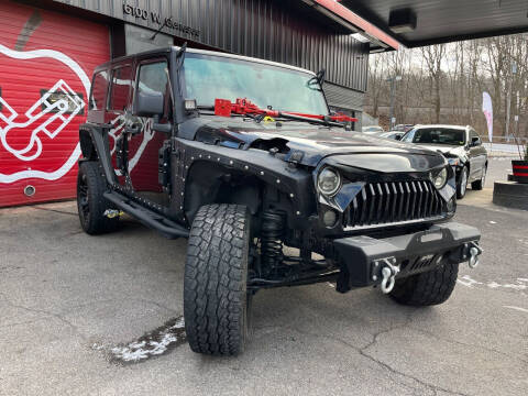 2012 Jeep Wrangler Unlimited for sale at Apple Auto Sales Inc in Camillus NY