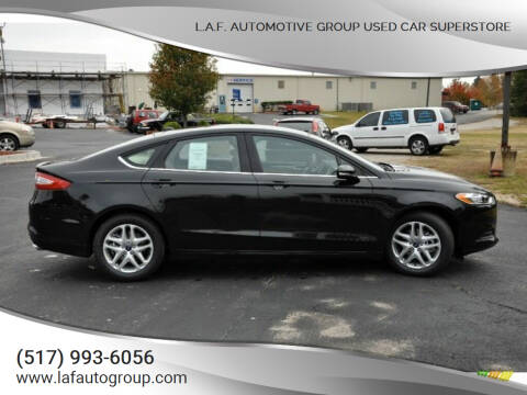 2013 Ford Fusion for sale at L.A.F. Automotive Group Used Car Superstore in Lansing MI