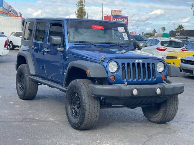 2010 Jeep Wrangler Unlimited for sale at Brown & Brown Auto Center in Mesa AZ