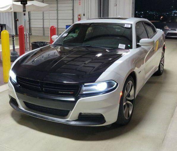 2015 Dodge Charger for sale at Dixie Motors Inc. in Northport AL