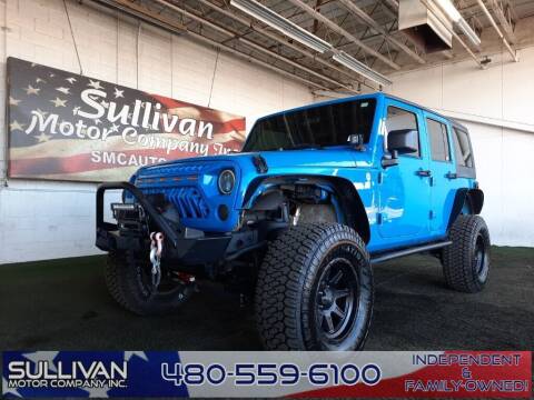 2012 Jeep Wrangler Unlimited for sale at SULLIVAN MOTOR COMPANY INC. in Mesa AZ