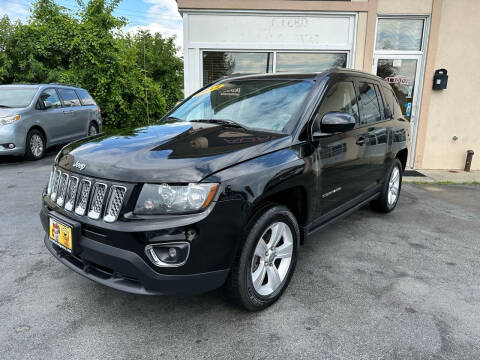 2015 Jeep Compass for sale at ADAM AUTO AGENCY in Rensselaer NY