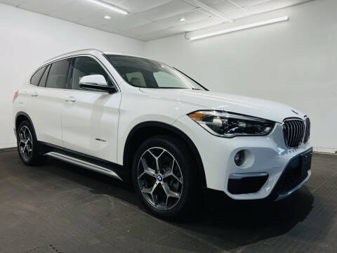 2016 BMW X1 for sale at Champagne Motor Car Company in Willimantic CT