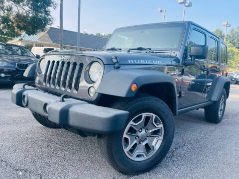 2014 Jeep Wrangler Unlimited for sale at Classic Luxury Motors in Buford GA