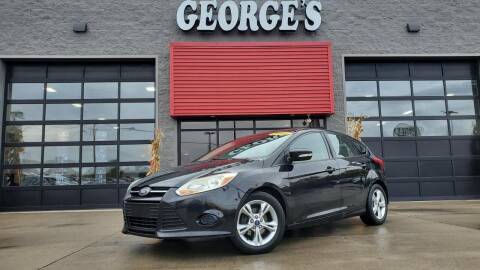 2014 Ford Focus for sale at George's Used Cars in Brownstown MI