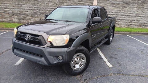 2012 Toyota Tacoma for sale at QG Autos in Atlanta GA