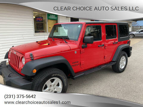 2013 Jeep Wrangler Unlimited for sale at Clear Choice Auto Sales LLC in Twin Lake MI