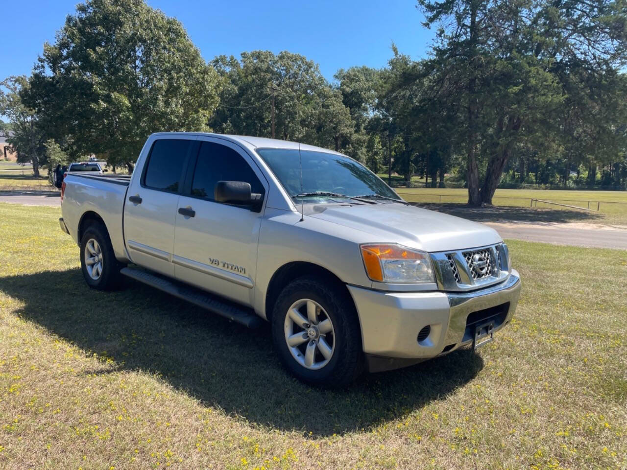 2013 Nissan Titan for sale at Russell Brothers Auto Sales in Tyler, TX