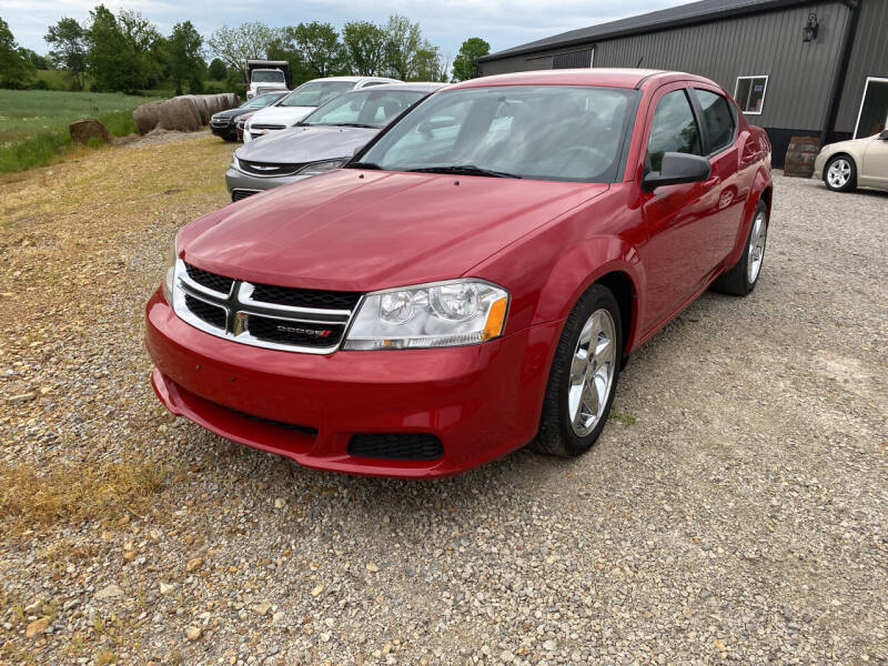 2013 Dodge Avenger for sale at RHK Motors LLC in West Union OH