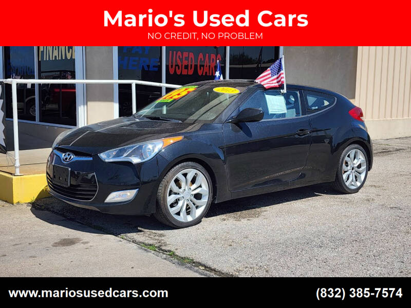 2013 Hyundai Veloster for sale at Mario's Used Cars in Houston TX