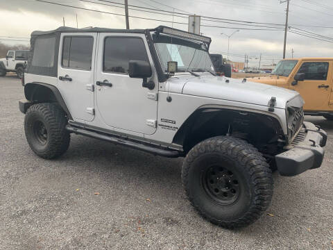 2011 Jeep Wrangler Unlimited for sale at The Jeep Stop in Sherman TX