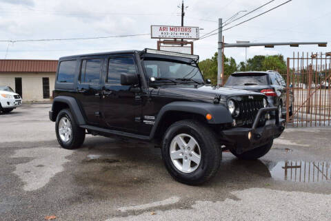 2015 Jeep Wrangler Unlimited for sale at ARI Motors in Houston TX