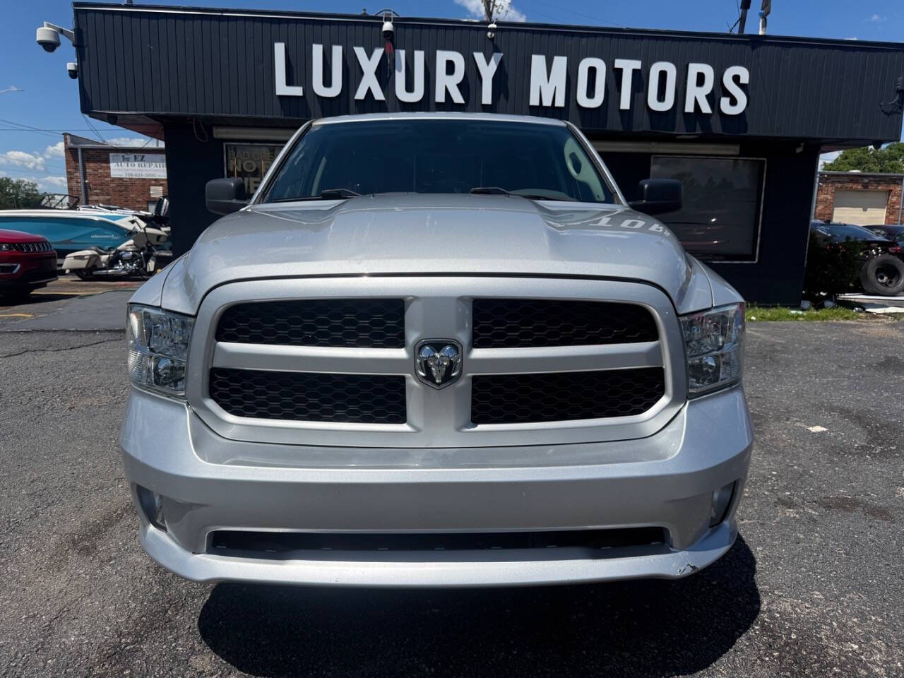 Silver 2018 Ram 1500 Express 4x4 Express 4dr Quad Cab 6.3 ft. SB Pickup 2