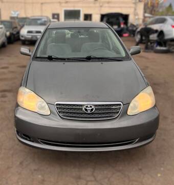2006 Toyota Corolla for sale at Queen Auto Sales in Denver CO