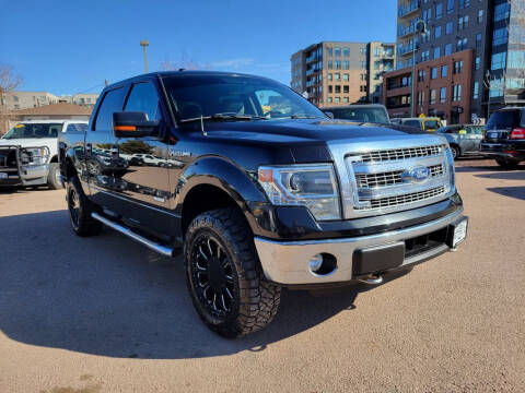 2014 Ford F-150 for sale at BERKENKOTTER MOTORS in Brighton CO