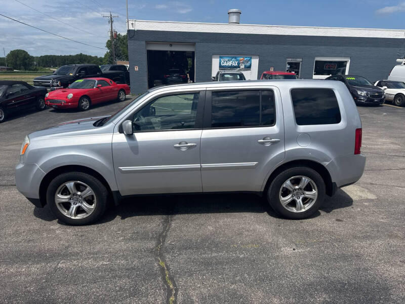 Used 2013 Honda Pilot EX-L with VIN 5FNYF4H58DB051228 for sale in Green Bay, WI