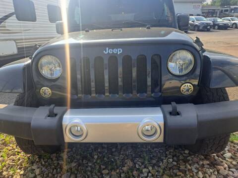 2014 Jeep Wrangler Unlimited for sale at Newport Auto Group in Boardman OH