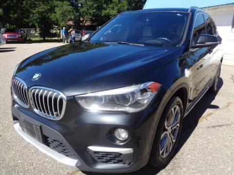 2016 BMW X1 for sale at Network Auto Source in Loveland CO