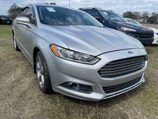 2014 Ford Fusion for sale at CREDIT AUTO in Lumberton TX