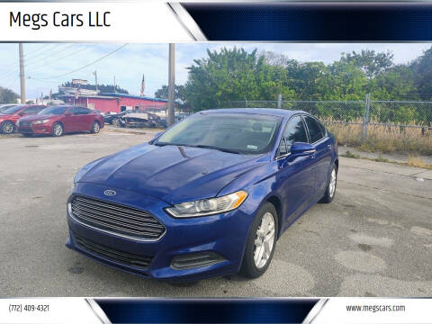 2015 Ford Fusion for sale at Megs Cars LLC in Fort Pierce FL