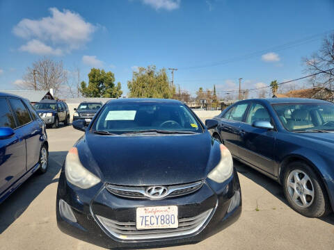 2011 Hyundai Elantra for sale at COMMUNITY AUTO in Fresno CA