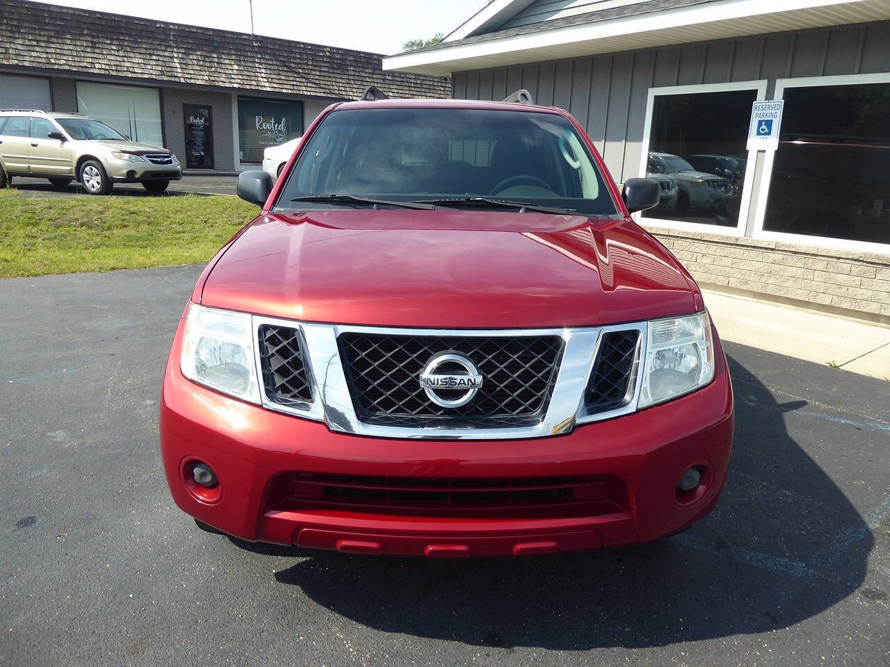 2010 Nissan Pathfinder for sale at Lakeshore Autos in Holland, MI