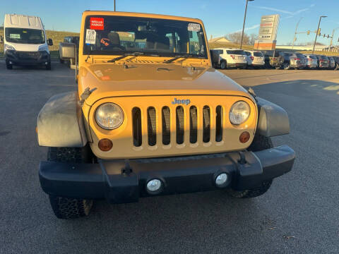 2013 Jeep Wrangler Unlimited for sale at Postal Pete in Galena IL