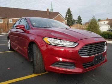 2013 Ford Fusion for sale at Dymix Used Autos & Luxury Cars Inc in Detroit MI