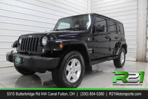 2016 Jeep Wrangler Unlimited for sale at Route 21 Auto Sales in Canal Fulton OH