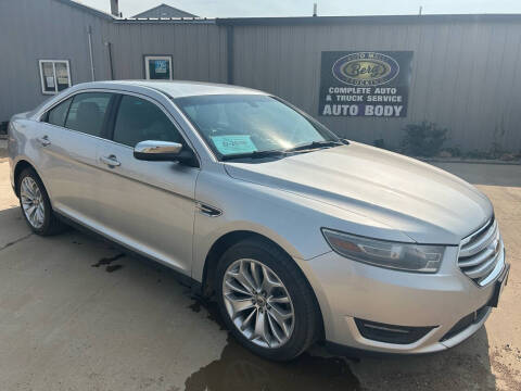 2013 Ford Taurus for sale at BERG AUTO MALL & TRUCKING INC in Beresford SD