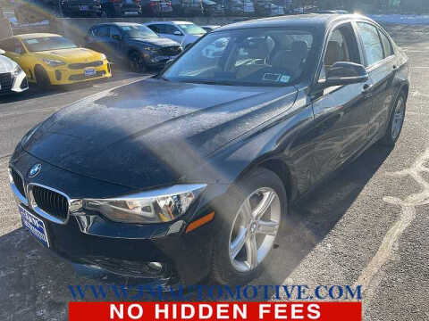 2015 BMW 3 Series for sale at J & M Automotive in Naugatuck CT