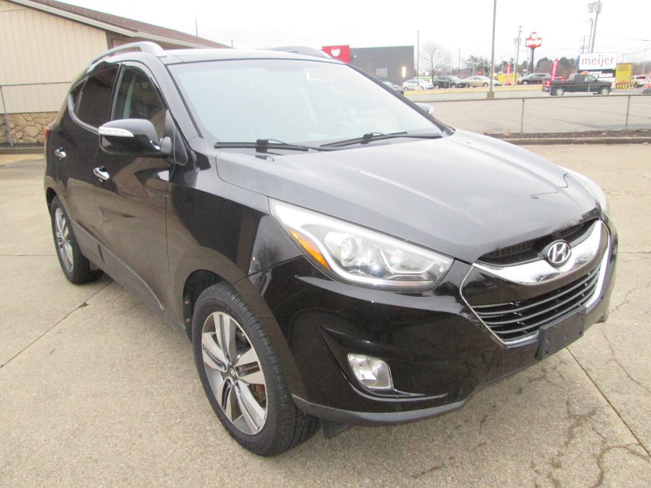 2015 Hyundai TUCSON for sale at AC Motors in North Canton, OH