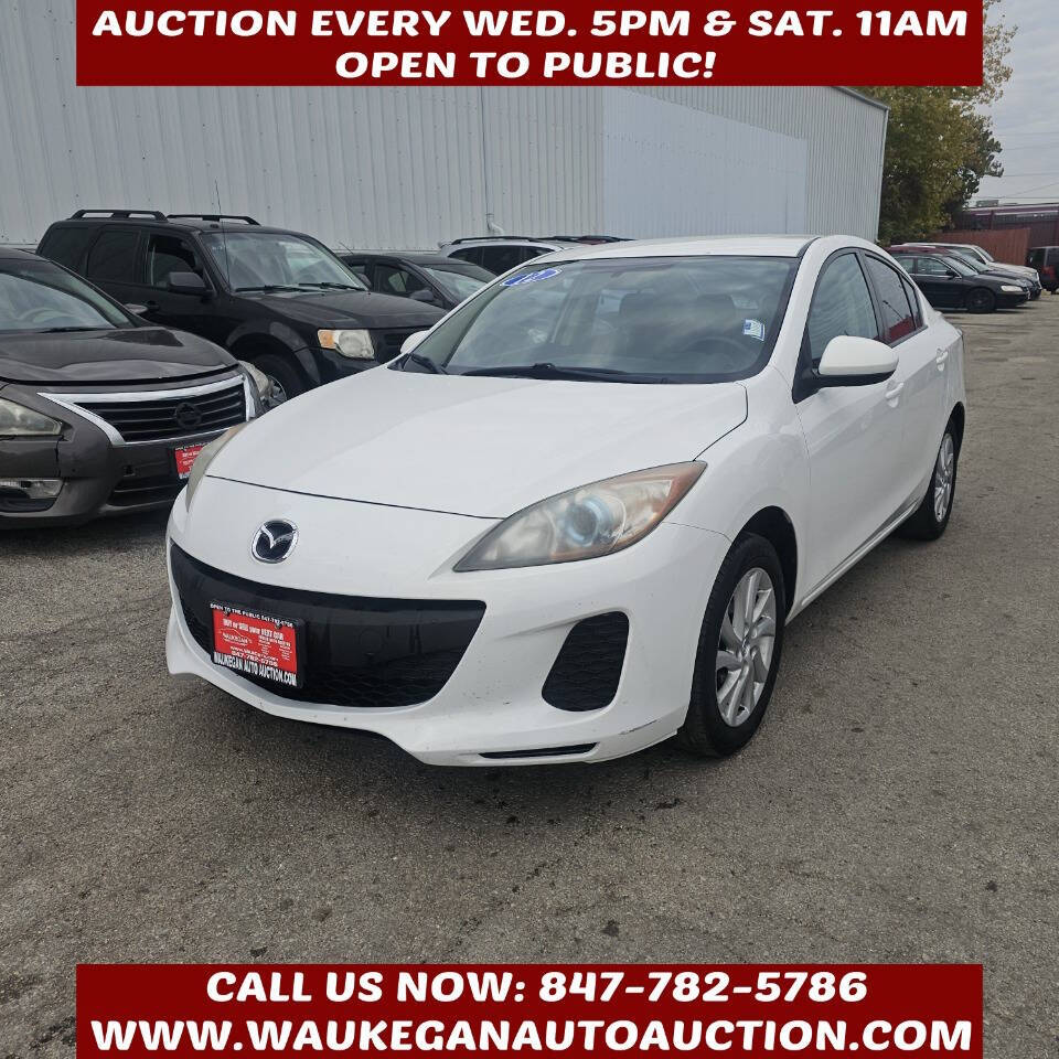 2012 Mazda MAZDA3 i Touring 4dr Sedan 6M's photo