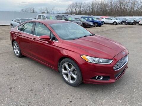 2014 Ford Fusion for sale at WELLER BUDGET LOT in Grand Rapids MI