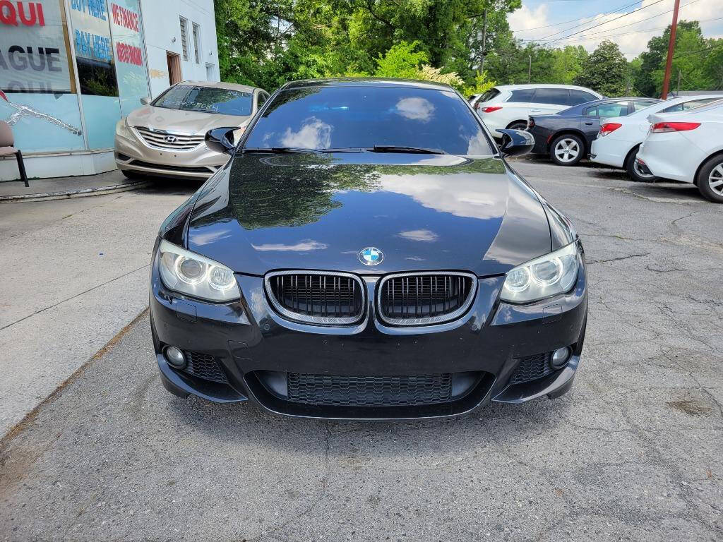 2011 BMW 3 Series for sale at DAGO'S AUTO SALES LLC in Dalton, GA