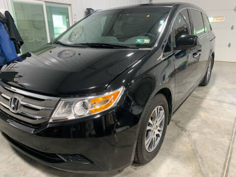 2011 Honda Odyssey for sale at PUTNAM AUTO SALES INC in Marietta OH