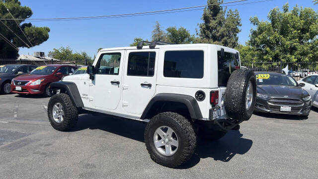 2012 Jeep Wrangler Unlimited for sale at Auto Plaza in Fresno, CA