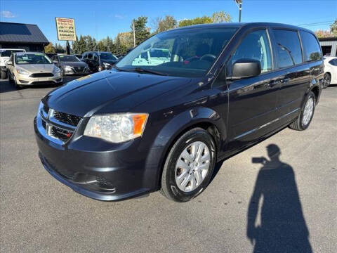 2014 Dodge Grand Caravan for sale at HUFF AUTO GROUP in Jackson MI