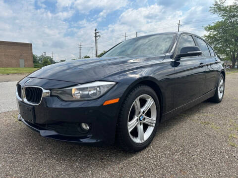 2014 BMW 3 Series for sale at Minnix Auto Sales LLC in Cuyahoga Falls OH